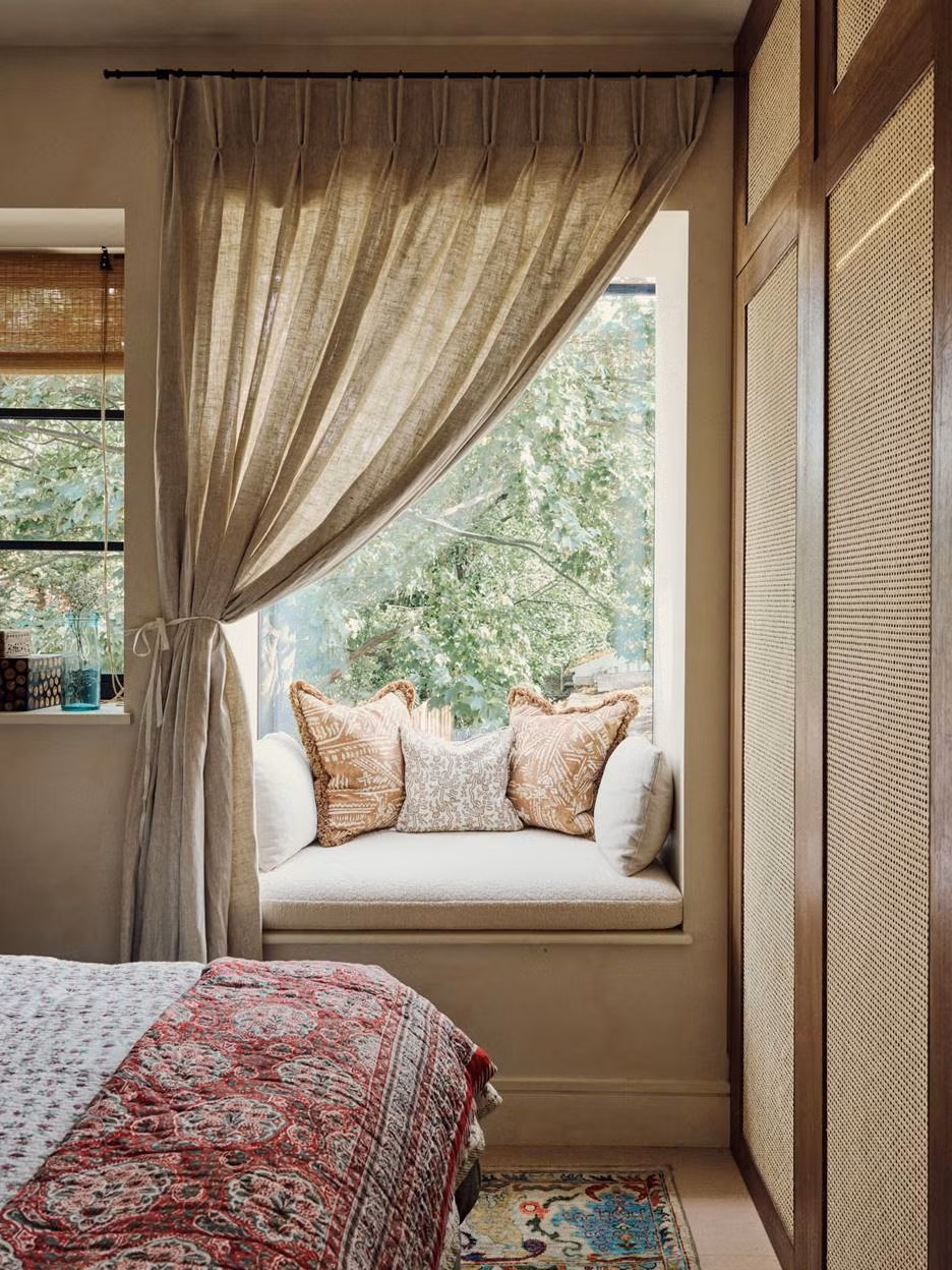 A welcoming window nook provides seating in the spare bedroom of Orlagh McCloskey's house.