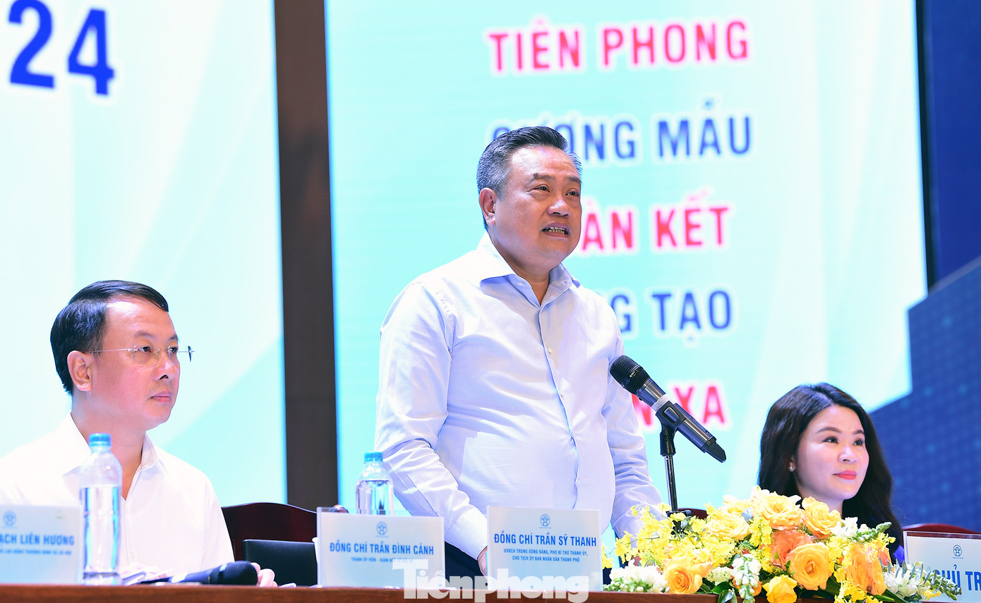 Ông Trần Sỹ Thanh trao đổi tại Hội nghị. Ảnh: Xuân Tùng