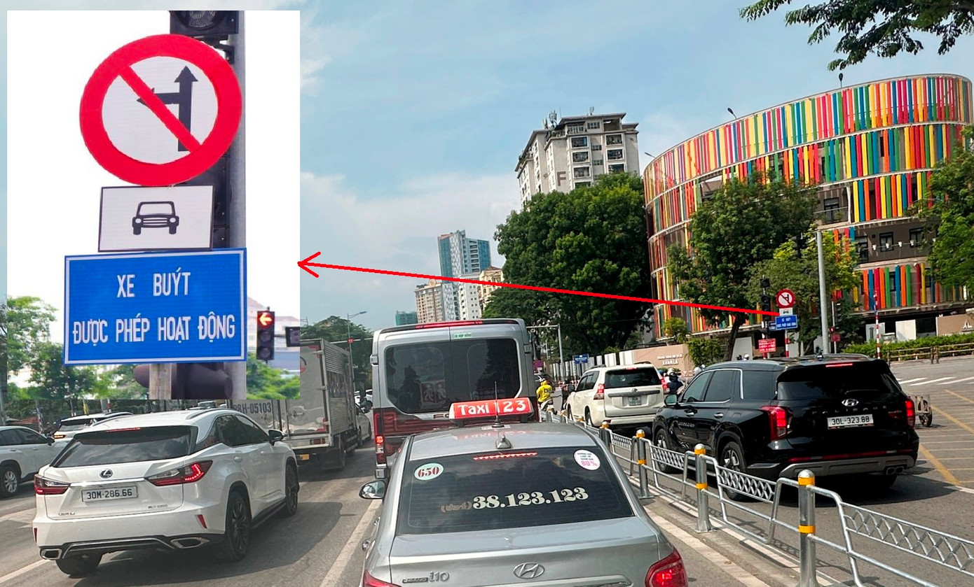 Biển báo cấm ô tô đi thẳng, rẽ trái được cắm ở cột gần cốt đèn tín hiệu (ảnh nhỏ) sau khi nhiều xe đã đi vào nút Võ Chí Công - Xuân La. Biển báo cấm ô tô đi thẳng, rẽ trái được cắm ở cột gần cốt đèn tín hiệu (ảnh nhỏ) sau khi nhiều xe đã đi vào nút Võ Chí Công - Xuân La.