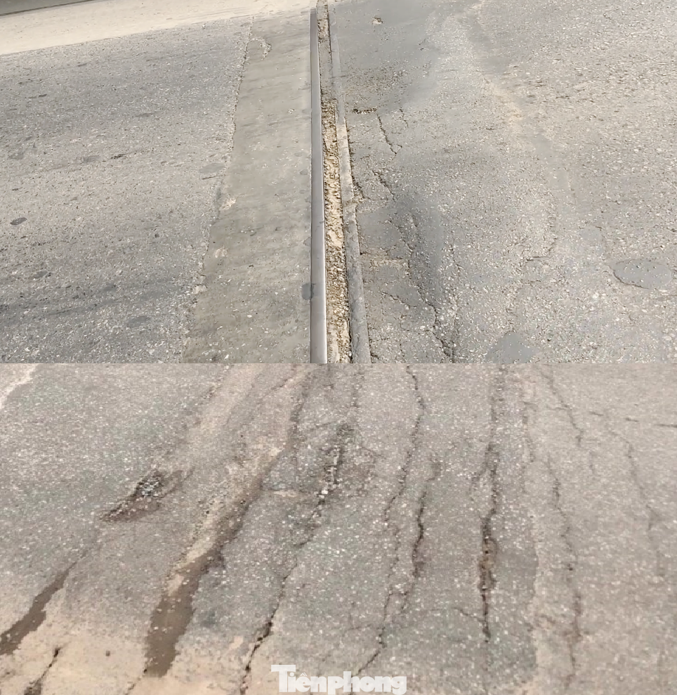 Khe co giãn hư hỏng tại đây đang xuất hiện các vết nứt, rách mặt đường nhựa. Khe co giãn hư hỏng tại đây đang xuất hiện các vết nứt, rách mặt đường nhựa.