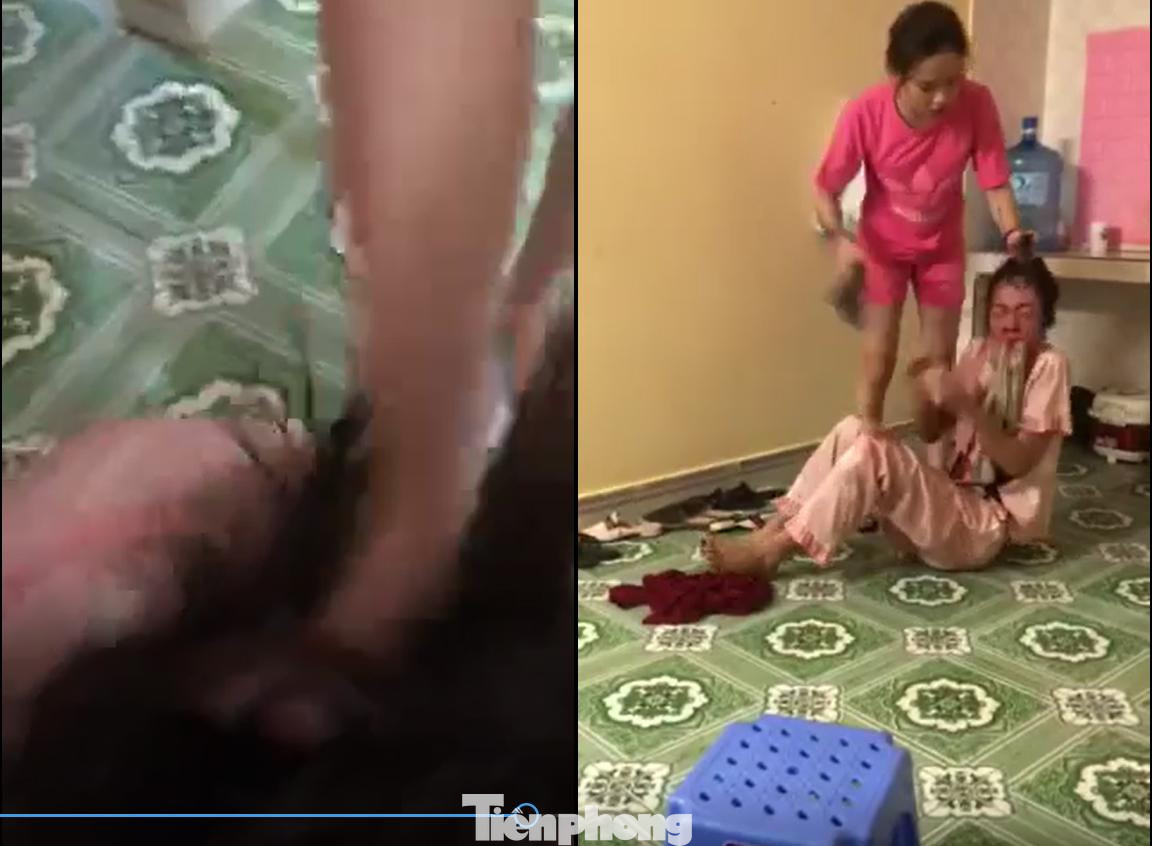 Cô gái bị hành hung van xin nhưng nhóm người không buông tha - Ảnh cắt từ clip