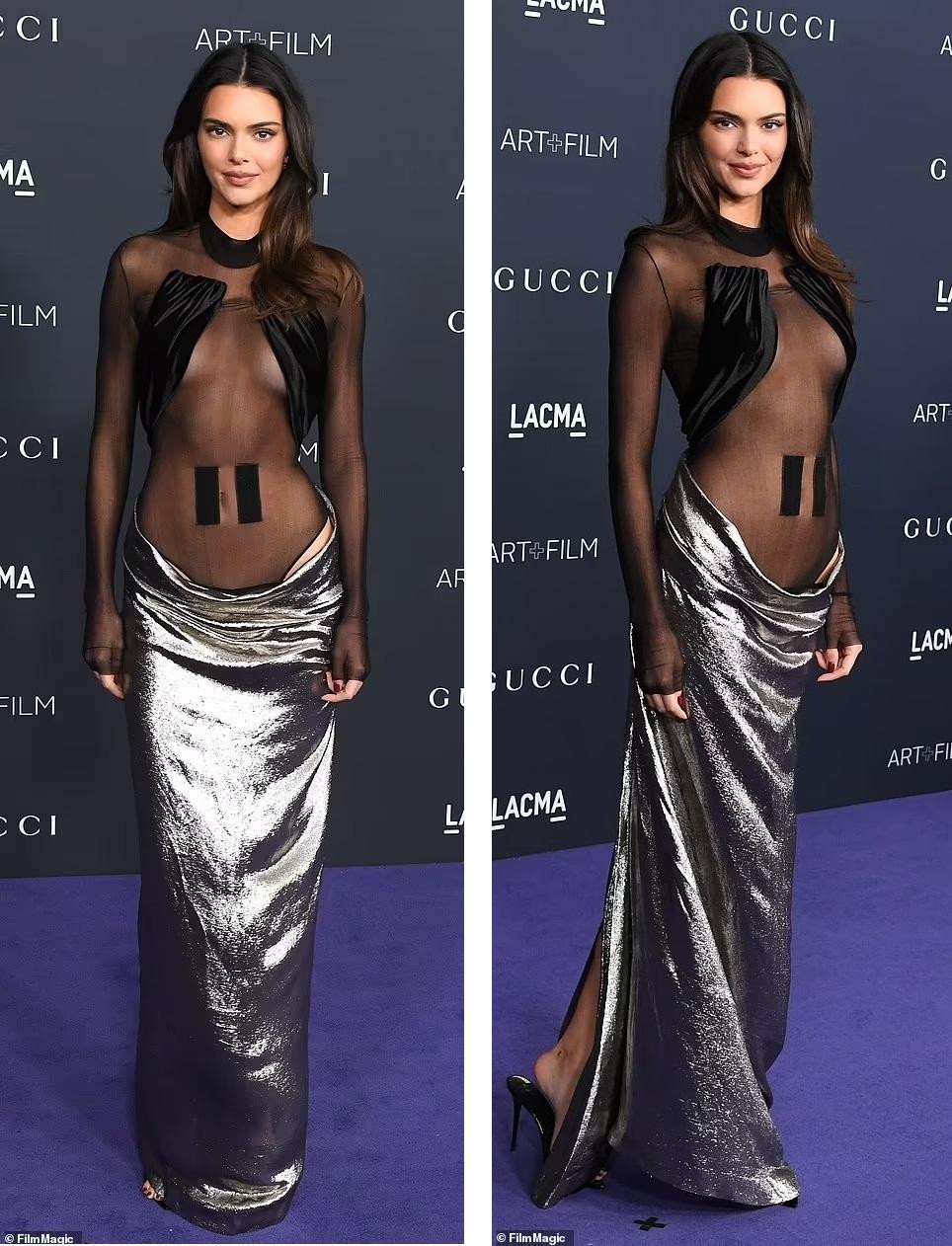 "Siêu mẫu đắt giá nhất thế giới" Kendall Jenner kết hợp bodysuit xuyên thấu với chân váy màu bạc. Ảnh: FilmMagic. "Siêu mẫu đắt giá nhất thế giới" Kendall Jenner kết hợp bodysuit xuyên thấu với chân váy màu bạc. Ảnh: FilmMagic.