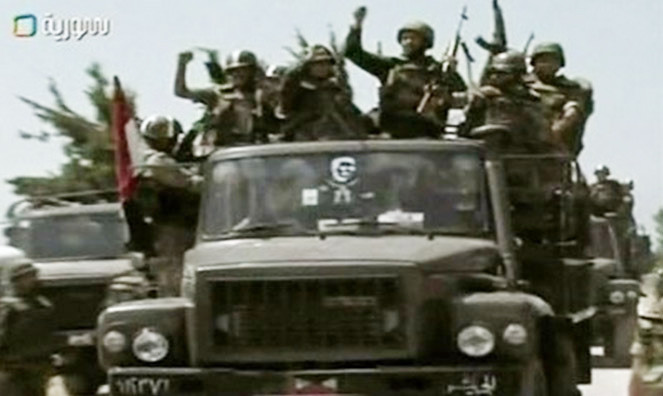 Quân đội Syria tiến vào thành phố Jisr al Shughour. Ảnh: Getty Images. Quân đội Syria tiến vào thành phố Jisr al Shughour Ảnh: Getty Images