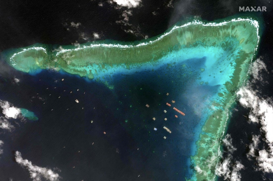Hình ảnh vệ tinh cho thấy các tàu Trung Quốc tập trung ở đá Ba Đầu thuộc quần đảo Trường Sa của Việt Nam vào tháng 3/2021 Ảnh: Maxar Hình ảnh vệ tinh cho thấy các tàu Trung Quốc tập trung ở đá Ba Đầu thuộc quần đảo Trường Sa của Việt Nam vào tháng 3/2021 Ảnh: Maxar