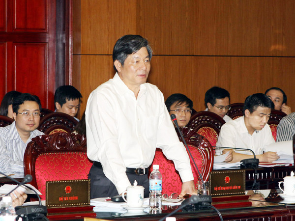 Bộ trưởng Bộ KH&ĐT Bùi Quang Vinh trình bày báo cáo bổ sung của Chính phủ Ảnh: TTXVN