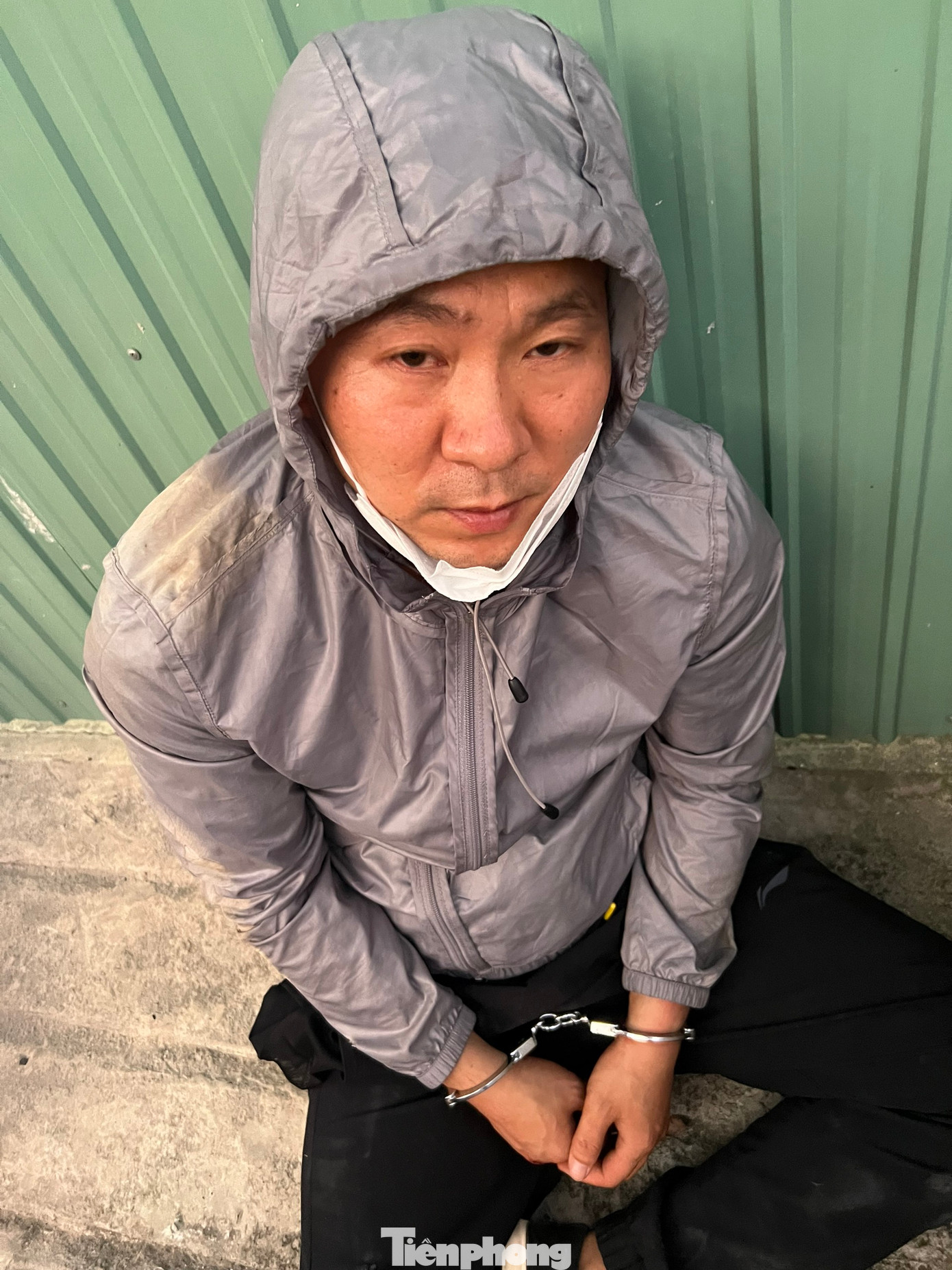 ZHAO XIN tại thời điểm bị bắt giữ khi đến nhận tiền