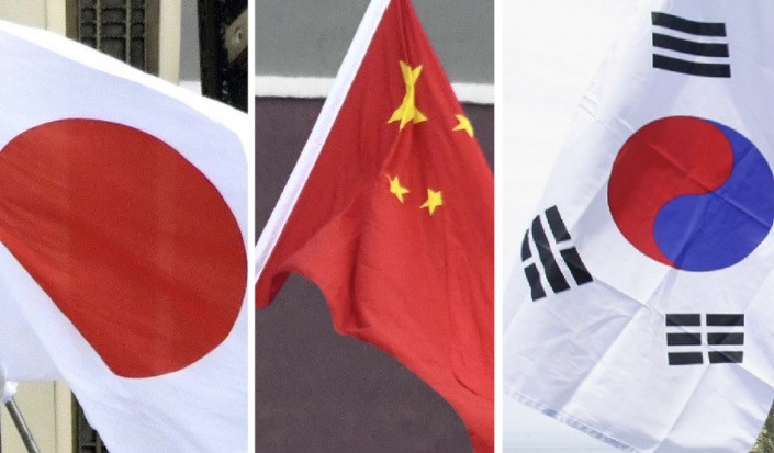 Quốc kỳ Nhật Bản, Trung Quốc và Hàn Quốc. (Ảnh: Kyodo)