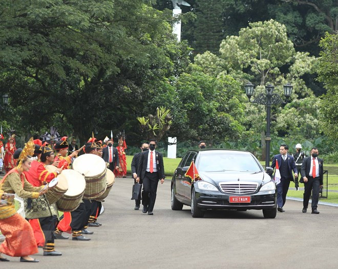 Lễ đón chính thức Chủ tịch nước Nguyễn Xuân Phúc thăm cấp Nhà nước tới nước Cộng hòa Indonesia. (Ảnh: Thống Nhất/TTXVN)