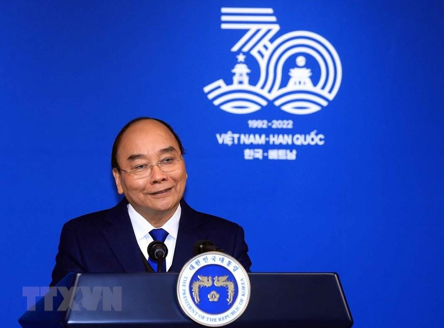 Chủ tịch nước Nguyễn Xuân Phúc phát biểu tại buổi họp báo.(Ảnh: Thống Nhất/TTXVN)