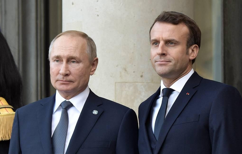 Tổng thống Nga Vladimir Putin và Tổng thống Pháp Emmanuel Macron. Ảnh: Tass