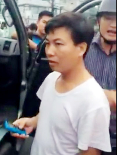 Kỷ luật 3 người bắt 2 trẻ em lên ôtô giữa ban ngày ảnh 1