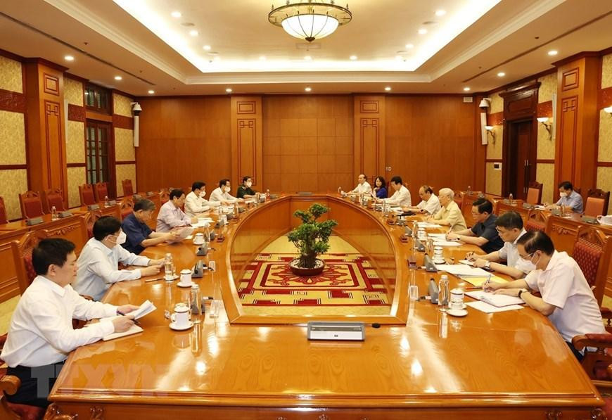 Lãnh đạo chủ chốt họp về công tác phòng, chống dịch (ảnh TTXVN) Lãnh đạo chủ chốt họp về công tác phòng, chống dịch (ảnh TTXVN)
