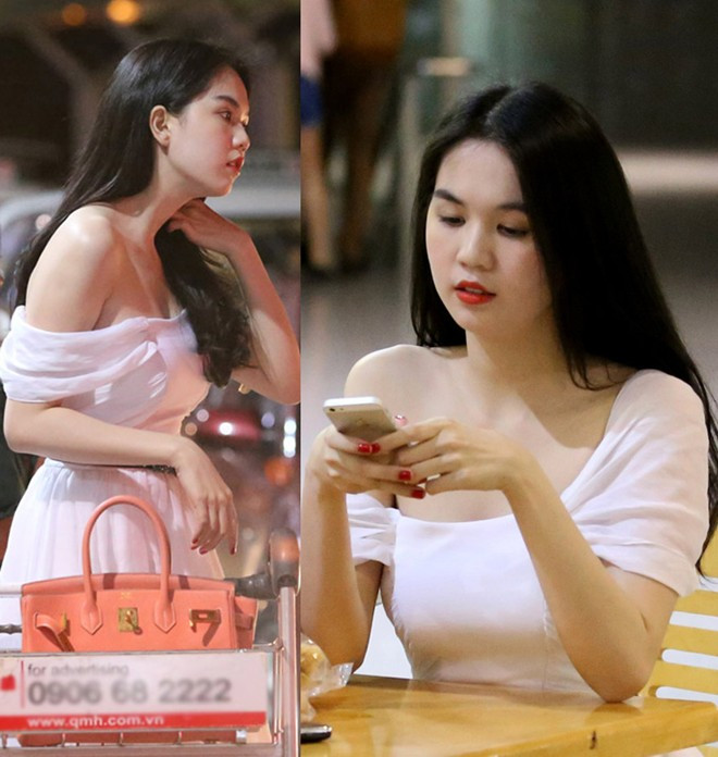 Trang phục ra sân bay của Ngọc Trinh cũng gợi cảm hơn nhờ bộ váy trắng cổ thuyền nữ tính 