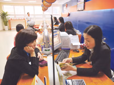 Ngân hàng đã có một năm thắng lớn . Ảnh: Hồng Vĩnh Ngân hàng đã có một năm thắng lớn