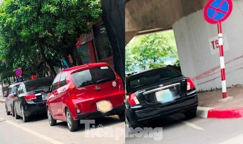 Nhiều bãi trông xe ngang nhiên kẻ vạch vôi chiếm dụng lòng đường Vành đai 3, ngay cạnh biển cấm dừng đỗ. Sự việc xảy ra cách trụ sở UBND phường Hoàng Liệt chỉ vài trăm mét (!?).