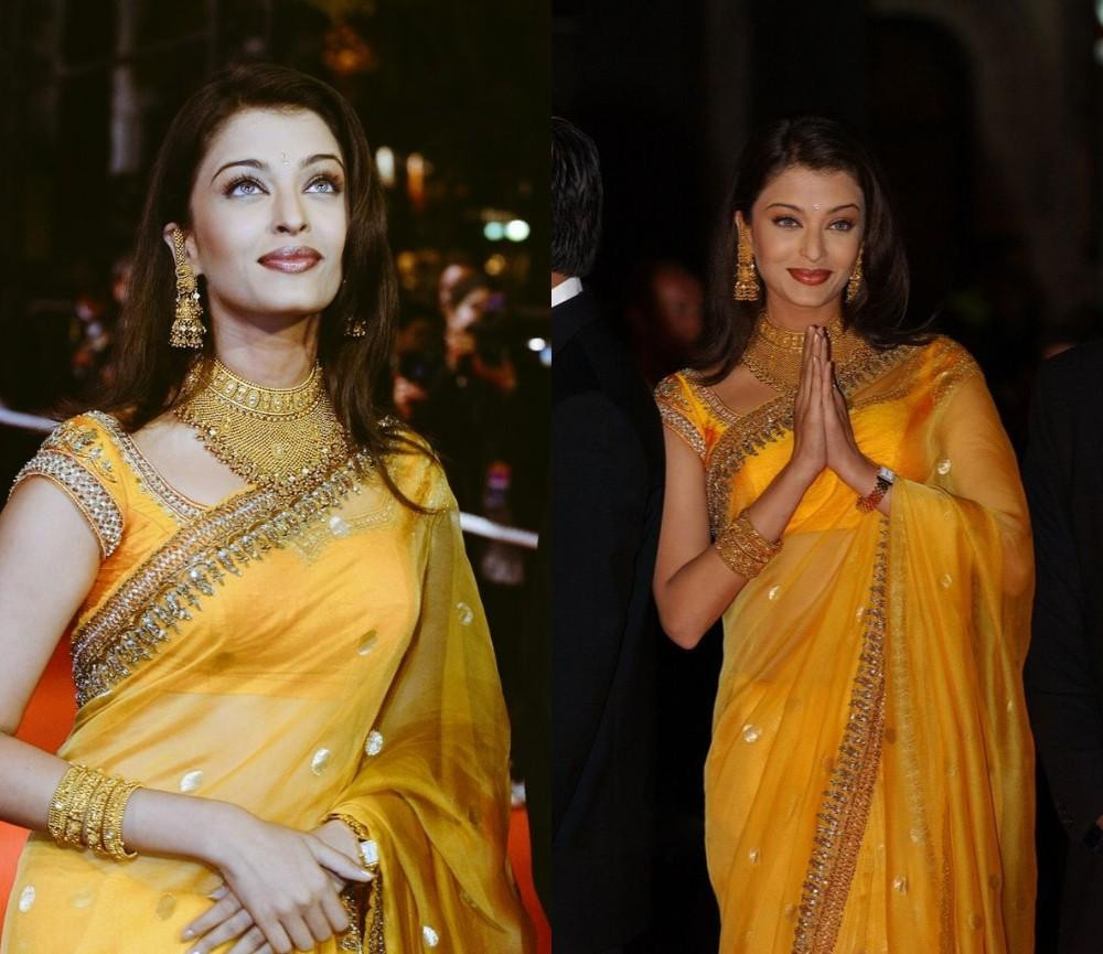 Năm 2002, Hoa hậu Thế giới 1994 Aishwarya Rai lần đầu tiên tham dự Liên hoan phim Cannes. Cô mang đến sự kiện điện ảnh thường niên này bộ trang phục truyền thống Ấn Độ (sari) màu vàng rực rỡ, kết hợp với trang sức vàng. Trước đó hai năm, cô được bình chọn là Hoa hậu đẹp nhất mọi thời đại. Năm 2002, Hoa hậu Thế giới 1994 Aishwarya Rai lần đầu tiên tham dự Liên hoan phim Cannes. Cô mang đến sự kiện điện ảnh thường niên này bộ trang phục truyền thống Ấn Độ (sari) màu vàng rực rỡ, kết hợp với trang sức vàng. Trước đó hai năm, cô được bình chọn là Hoa hậu đẹp nhất mọi thời đại.