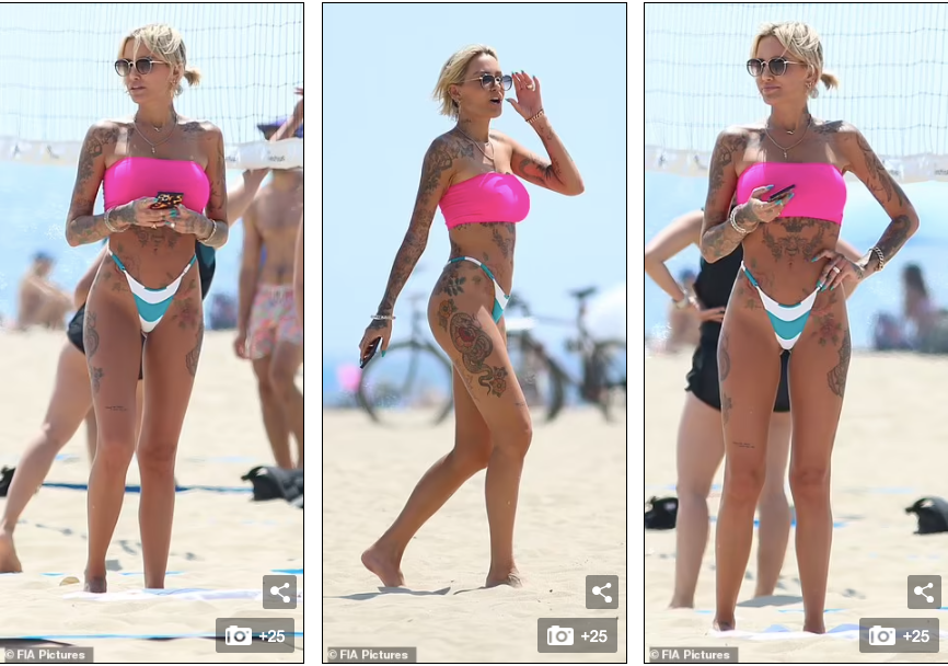 Nàng mẫu người Úc không chỉ nổi tiếng bởi body săn chắc 0% mỡ thừa mà còn phủ ngập hình xăm nghệ thuật. Vẻ đẹp cá tính và "nổi loạn" của Tina Louise luôn thu hút mọi ánh nhìn mỗi khi cô xuất hiện ở biển. Nàng mẫu người Úc không chỉ nổi tiếng bởi body săn chắc 0% mỡ thừa mà còn phủ ngập hình xăm nghệ thuật. Vẻ đẹp cá tính và "nổi loạn" của Tina Louise luôn thu hút mọi ánh nhìn mỗi khi cô xuất hiện ở biển.