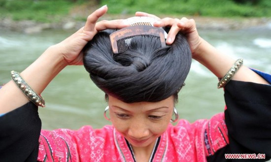 Nuôi tóc dài là truyền thống lâu đời của người dân tộc Dao đỏ ở Trung Quốc