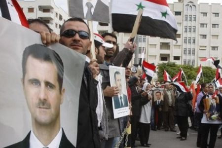 Người dân Syria đang ủng hộ tổng thống Assad ngày 14-11. Ảnh: Press TV