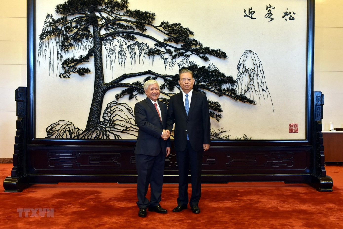 Chủ tịch Quốc hội Trung Quốc Triệu Lạc Tế và Chủ tịch Ủy ban Trung ương Mặt trận Tổ quốc Việt Nam Đỗ Văn Chiến. (Ảnh: Thanh Dương/TTXVN) Chủ tịch Quốc hội Trung Quốc Triệu Lạc Tế và Chủ tịch Ủy ban Trung ương Mặt trận Tổ quốc Việt Nam Đỗ Văn Chiến. (Ảnh: Thanh Dương/TTXVN)