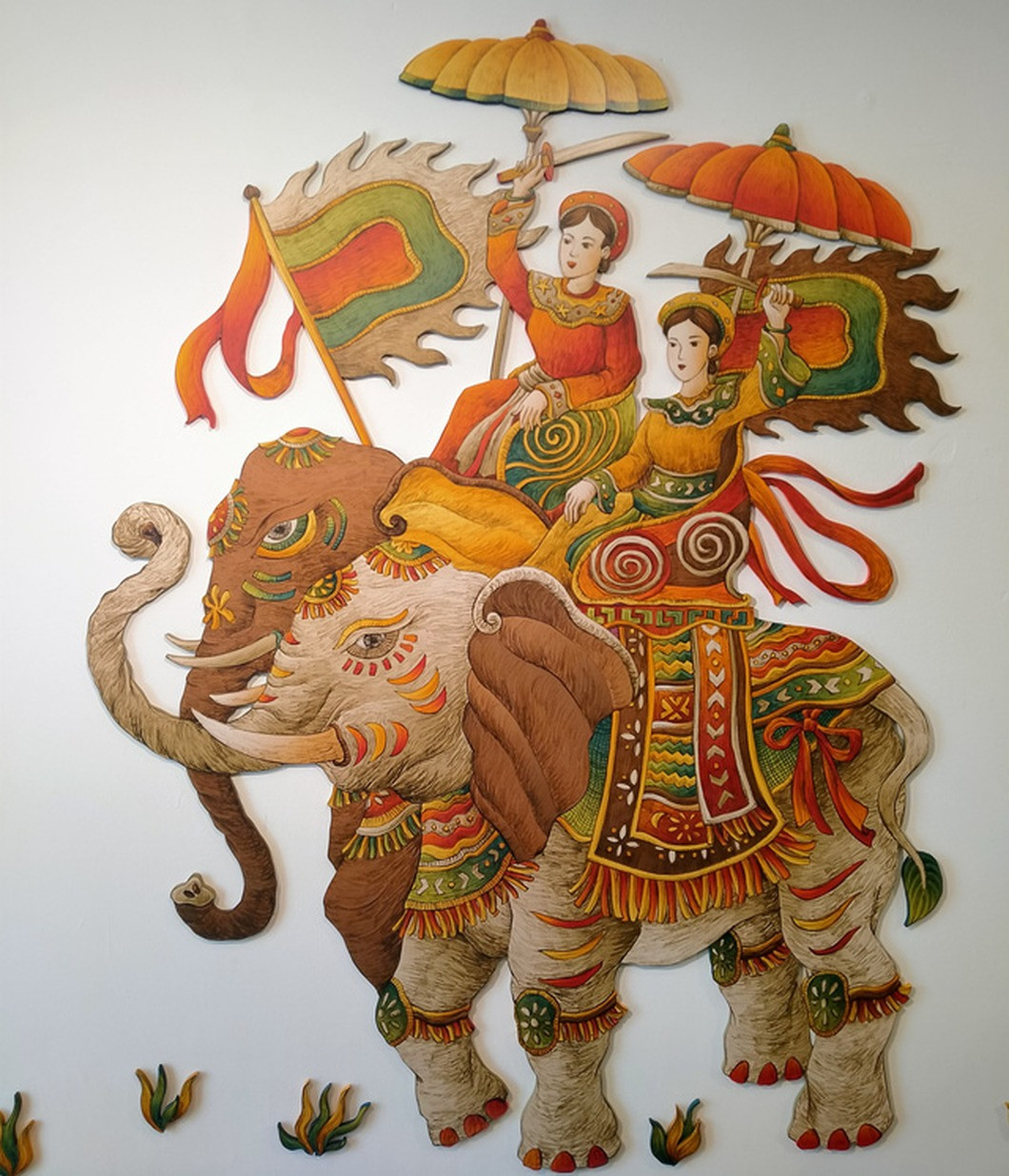 Họa sĩ Xuân Lam cùng các tác phẩm của anh. Ảnh: FBNV.