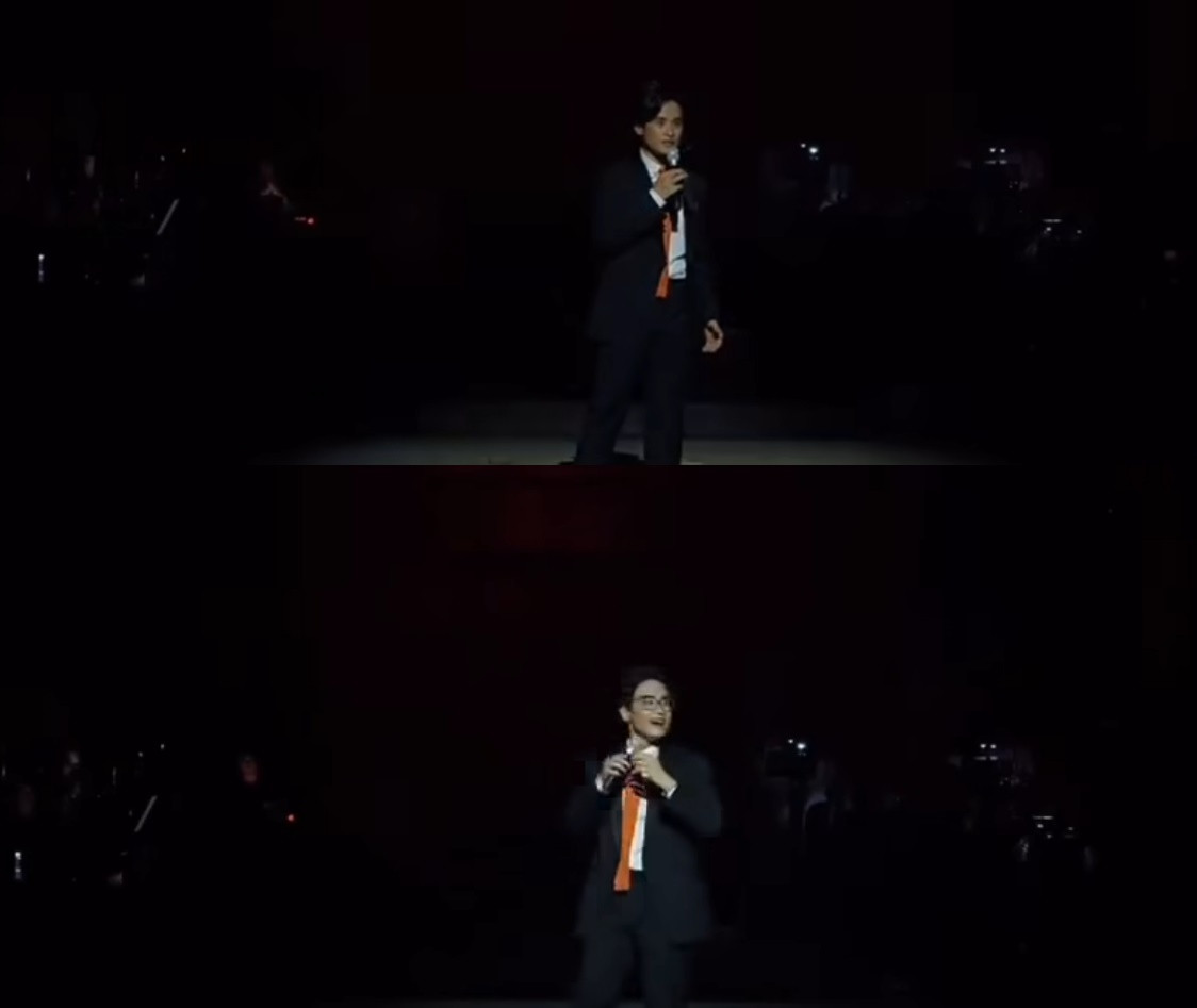 Hà Anh Tuấn ngơ ngác vì bị tắt đèn. Ảnh trích từ video.