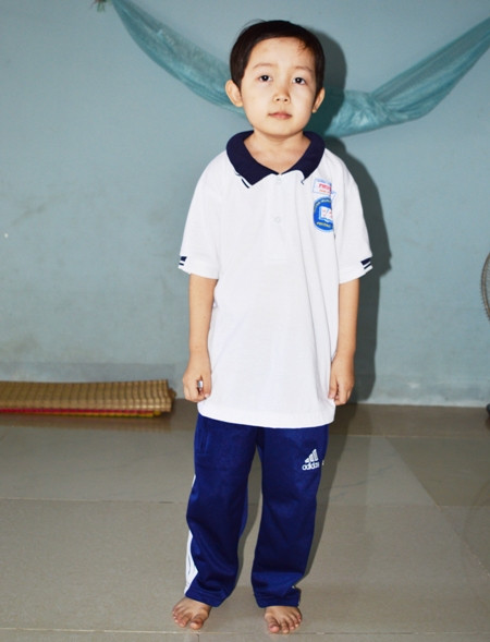 Nghị lực của cậu học sinh lớp 9 cao 1m ảnh 1