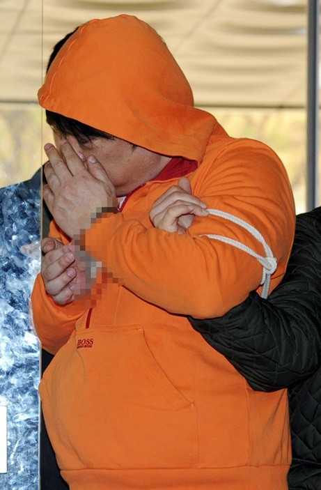 Jang Seok Woo khi bị bắt