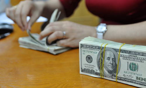 Ngân hàng Nhà nước mua 7,7 tỷ USD trong quý I ảnh 1