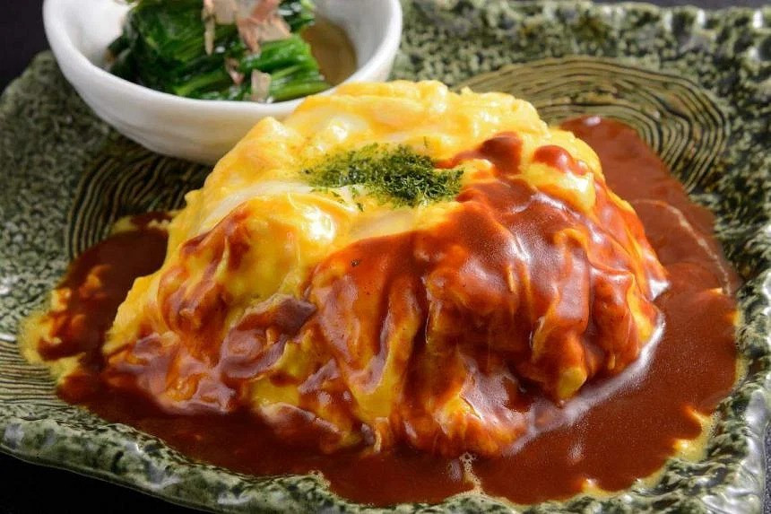 Món omurice. Ảnh: Straitstimes Món omurice. Ảnh: Straitstimes