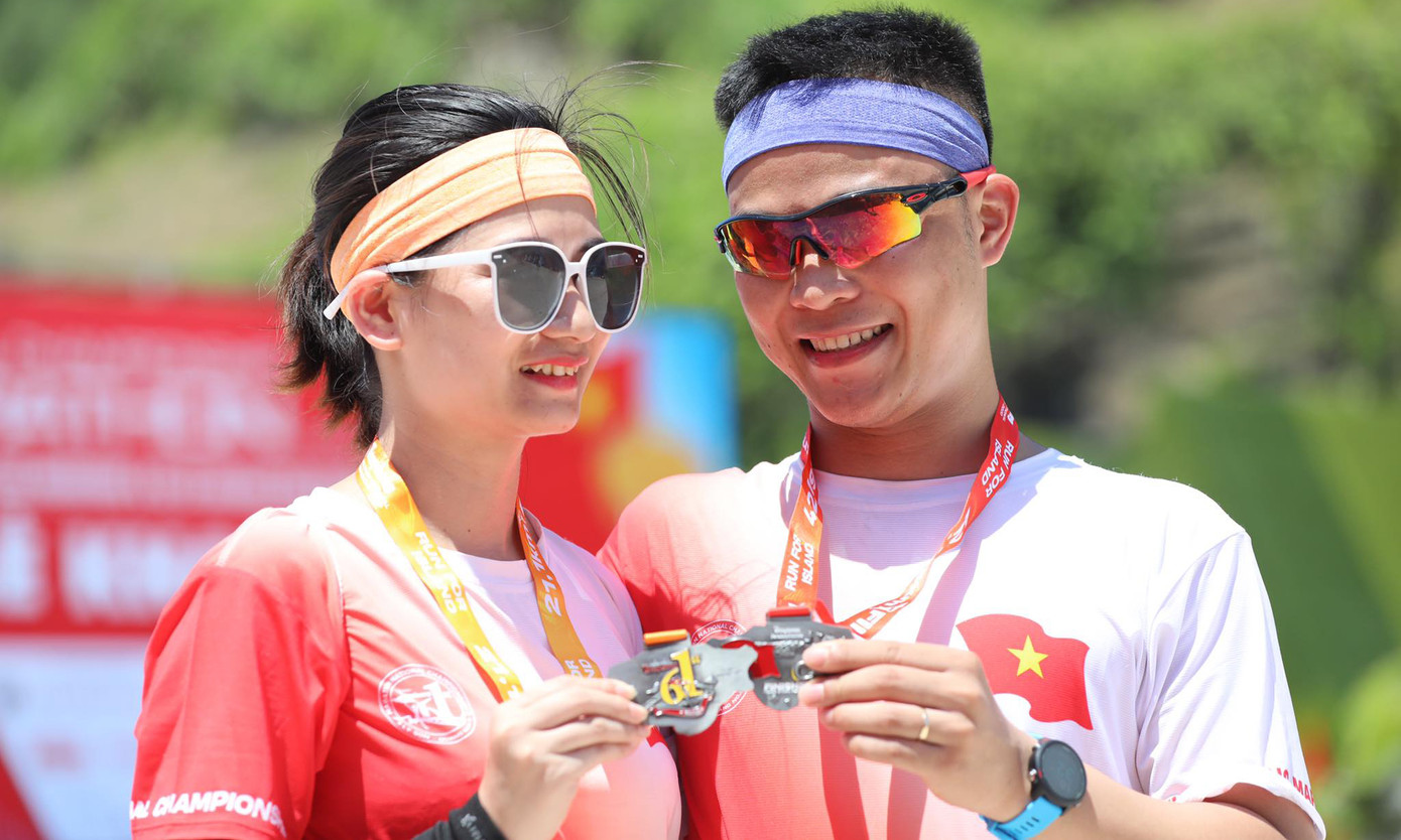 Nụ cười chiến thắng trên đường chạy giữa đại dương ảnh 13