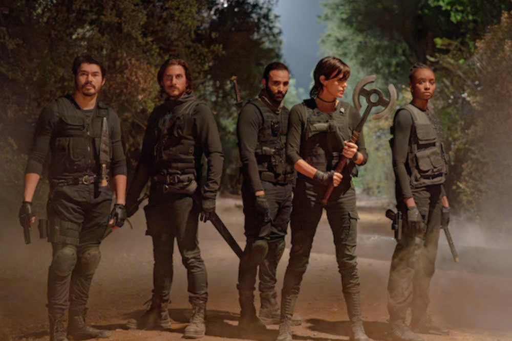 Andy và đội quân bất tử của cô trong phim "The Old Guard". Ảnh: Netflix Andy và đội quân bất tử của cô trong phim "The Old Guard". Ảnh: Netflix