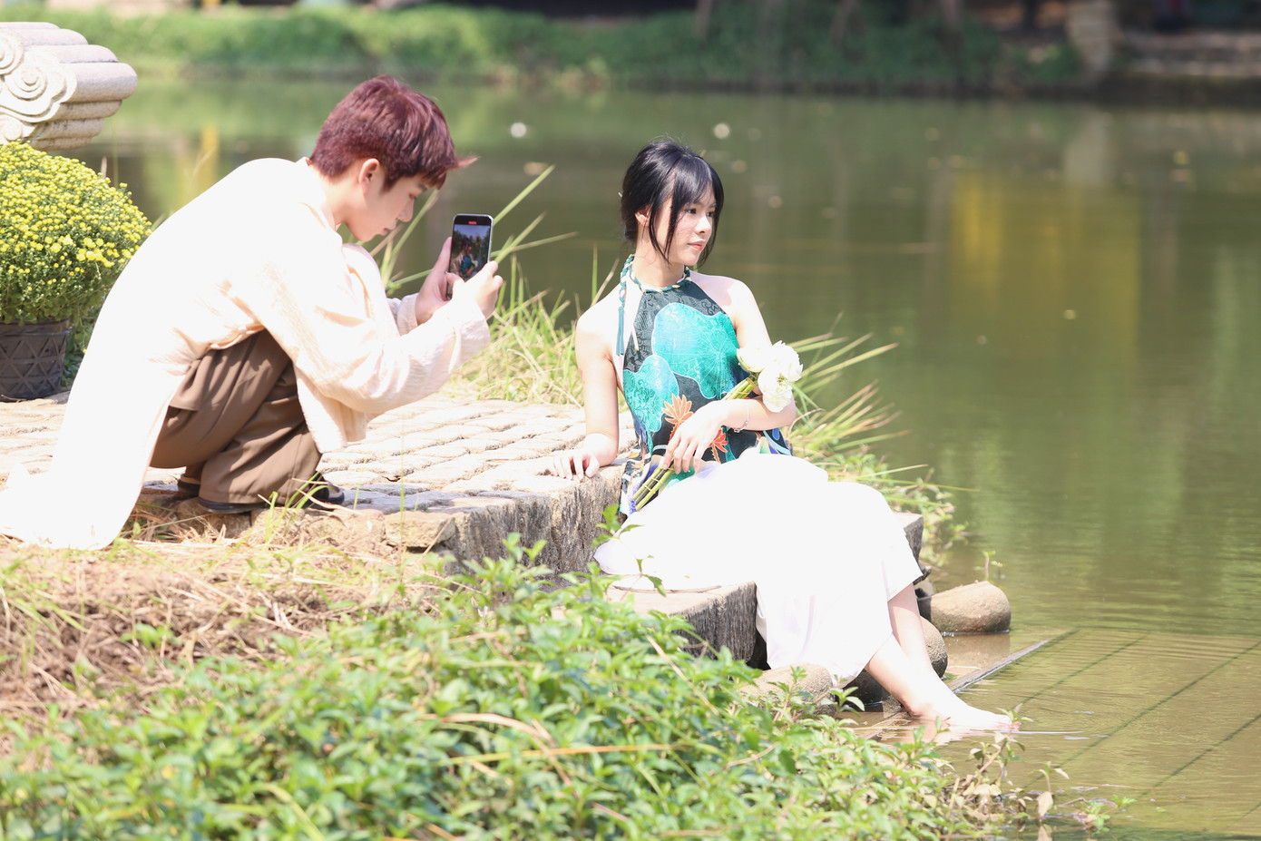 Cũng tại điểm du lịch này, hồ nước nằm ở vị trí trung tâm bảo tàng là điểm nhấn thú vị để tạo dáng.