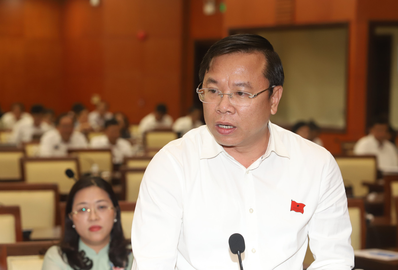 Bí thư Quận ủy Bình Tân Huỳnh Khắc Điệp nêu vấn đề tại phiên thảo luận. Ảnh: Ngô Tùng. Bí thư Quận ủy Bình Tân Huỳnh Khắc Điệp nêu vấn đề tại phiên thảo luận. Ảnh: Ngô Tùng.