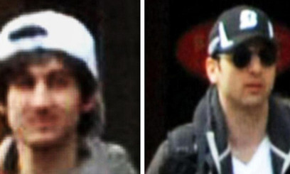 Nghi phạm là anh trai (phải) bị bắn chết, còn em trai đang chạy trốn. Ảnh: CNN. Nghi phạm là anh trai (phải) bị bắn chết, còn em trai đang chạy trốn. Ảnh: CNN