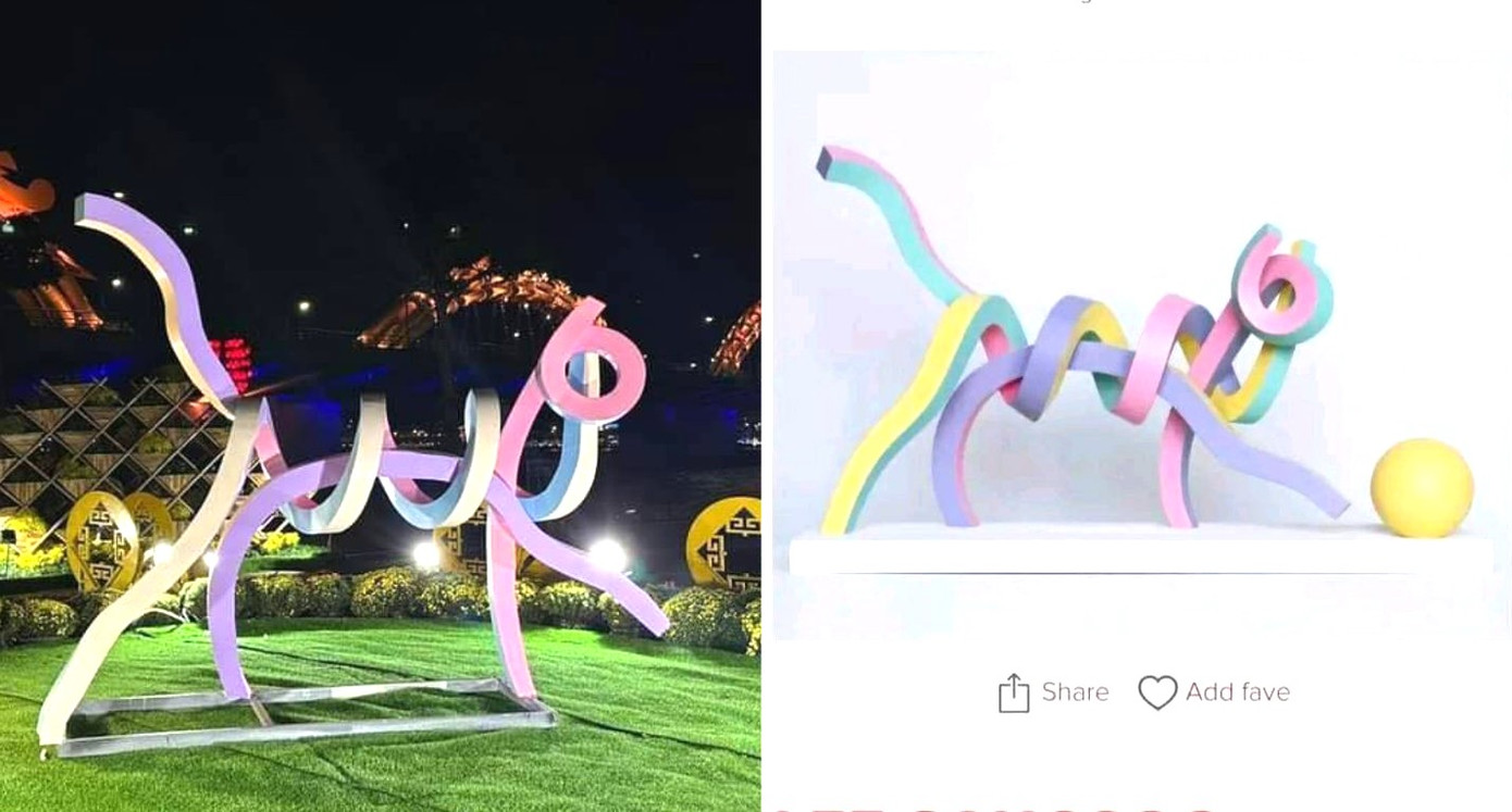 Linh vật mèo trên thực tế và bản thiết kế của tác giả Lee Sang Goo. Linh vật mèo trên thực tế và bản thiết kế của tác giả Lee Sang Goo.