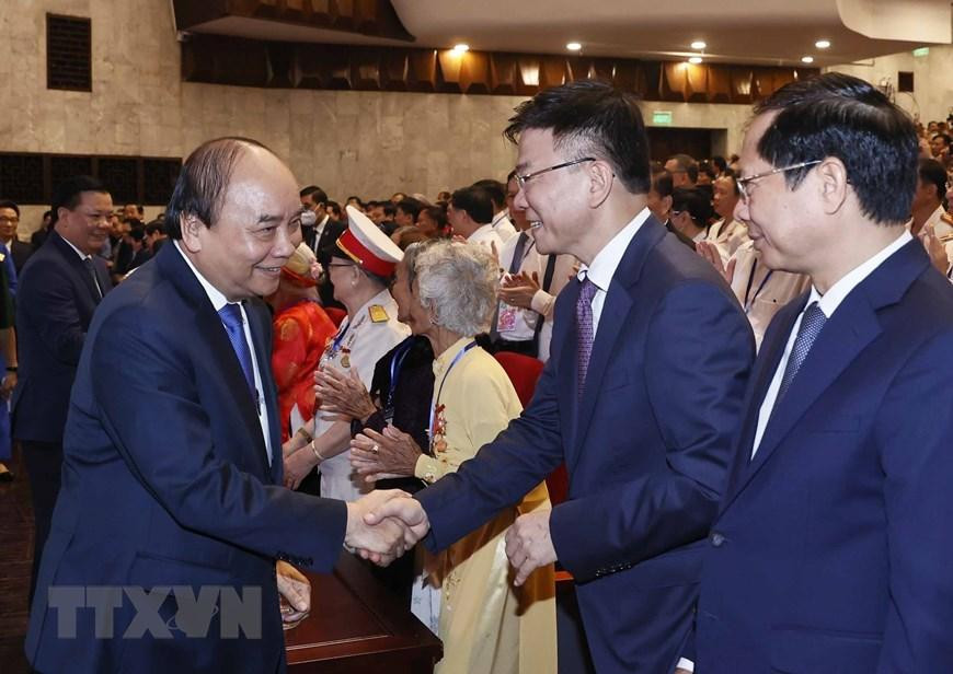 Chủ tịch nước Nguyễn Xuân Phúc dự Lễ kỷ niệm 75 năm ngày Thương binh liệt sỹ và tuyên dương người có công toàn quốc 2022. (Ảnh: Thống Nhất/TTXVN)