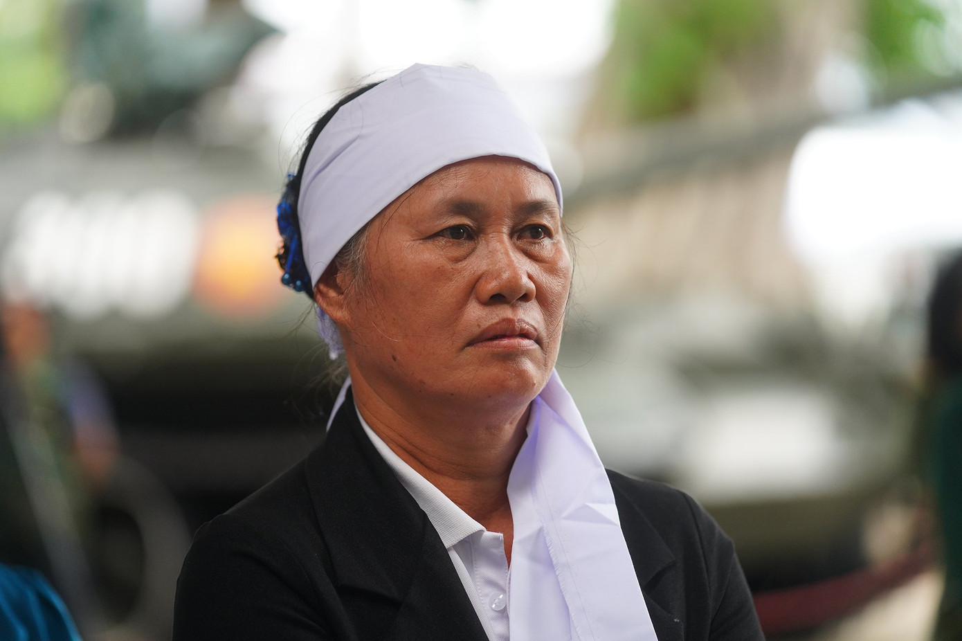 Người dân TPHCM để tang trắng theo dõi lễ truy điệu Tổng Bí thư Nguyễn Phú Trọng.