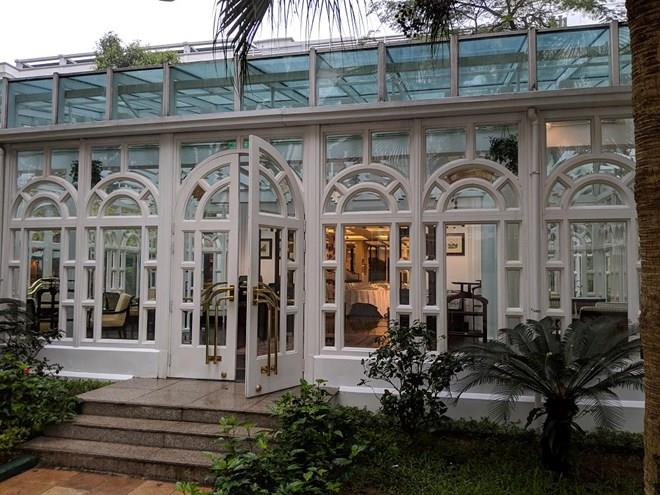 Bữa tối kết thúc, Tổng thống Trump và Chủ tịch Kim rời khách sạn Metropole ảnh 26