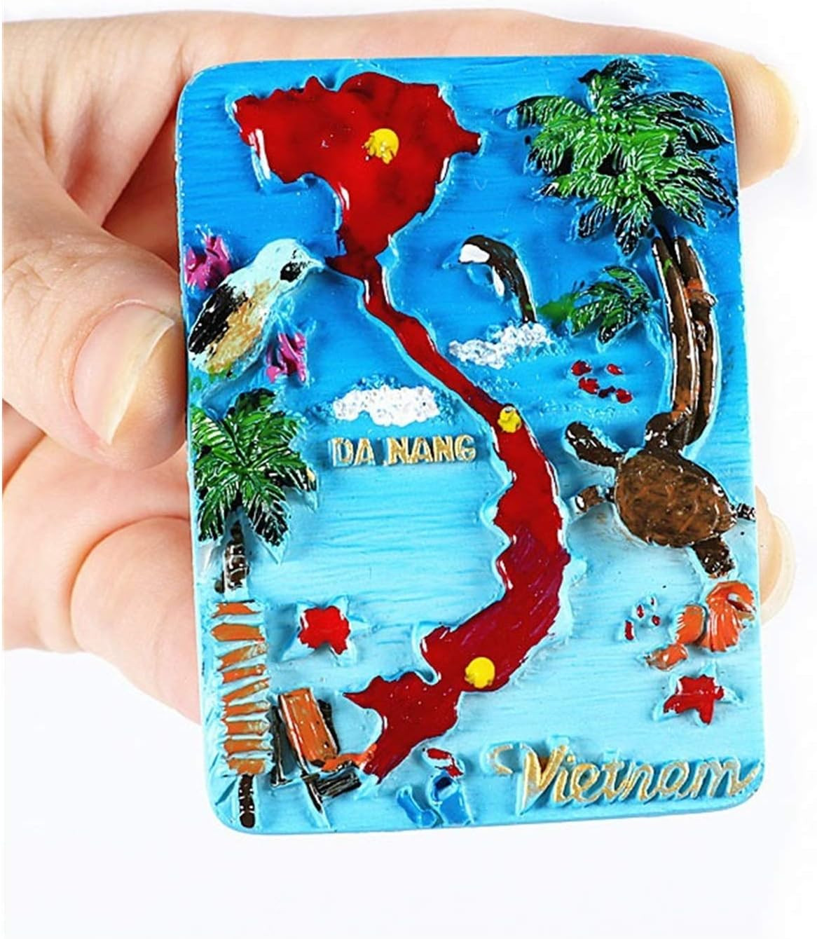 Hình ảnh rõ nét hơn của chiếc nam châm, khu vực đất liền, biển đảo được in sơn đỏ.