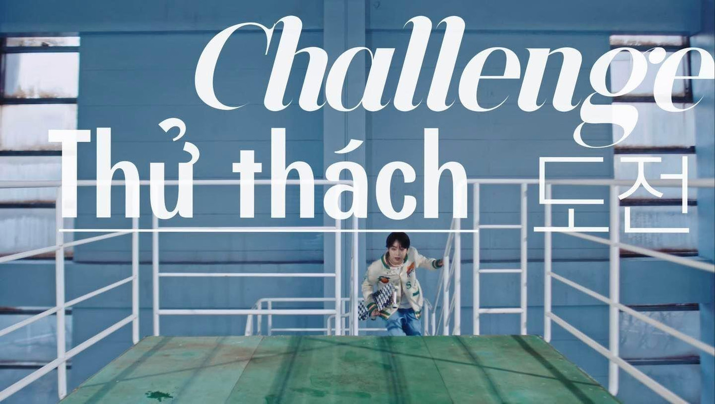 Cụm từ "thử thách" với 3 ngôn ngữ: Tiếng Việt, tiếng Hàn, tiếng Anh được lồng ghép trong trailer của Hanbin. Cụm từ "thử thách" với 3 ngôn ngữ: Tiếng Việt, tiếng Hàn, tiếng Anh được lồng ghép trong trailer của Hanbin.