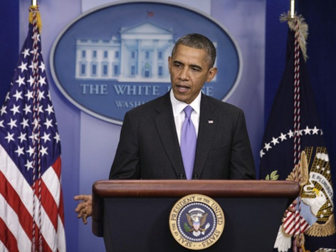 Tổng thống Barack Obama phát biểu với báo giới sau khi Thượng viện thông qua dự luật cho phép mở cửa chính phủ trở lại. Ảnh: Getty Images