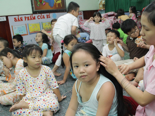 Một buổi sinh hoạt của cô trò Trường mầm non Sài Gòn Q.10, TP.HCM sáng 4-2-2013. Ảnh: Như Hùng