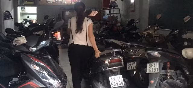 Đằng sau việc dẹp bãi xe ở vỉa hè trung tâm TPHCM ảnh 2