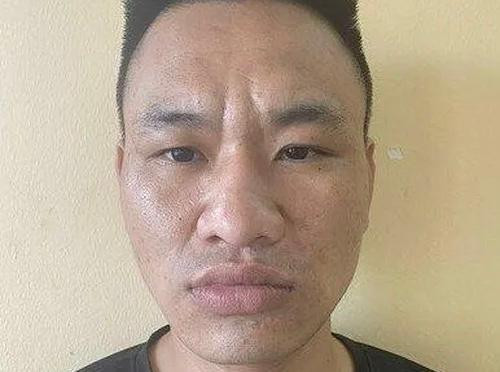 Bị can Nghiêm Viết Minh tại cơ quan công an.