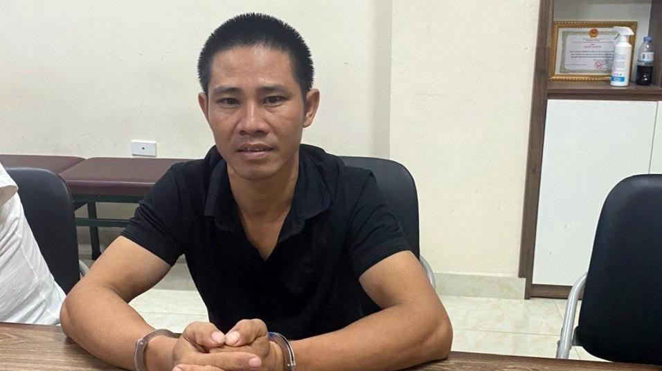 Nghi phạm Nguyễn Đại Quang tại cơ quan công an.