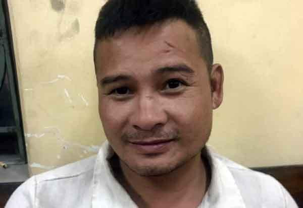 Bị can Nguyễn Đăng Thắng tại cơ quan công an.