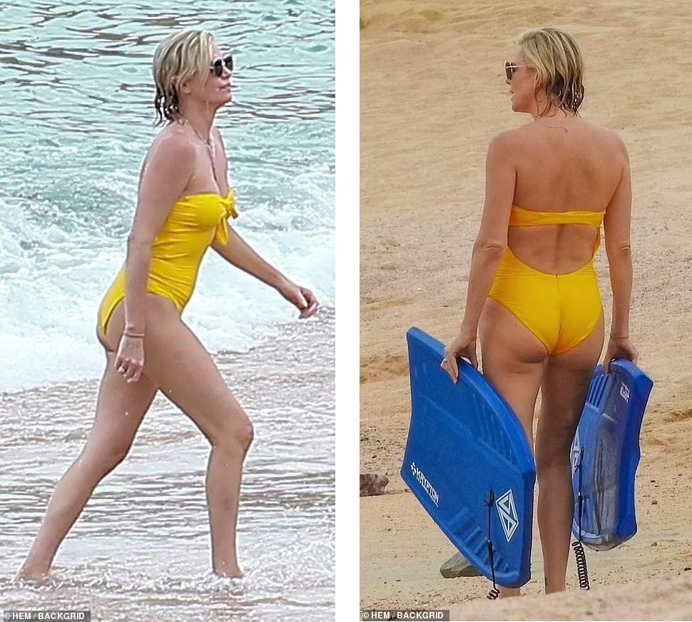 Đồ bơi giúp nữ diễn viên &quot;Bạch Tuyết và gã thợ săn&quot; khoe vóc dáng cân đối, săn chắc, đặc biệt là đôi chân dài thon nuột. Được biết, Charlize cao 1m77.