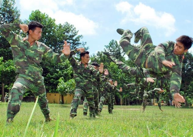  Lính đặc công sẵn sàng chiến đấu Lính đặc công huấn luyện võ thuật. (Nguồn: Binh chủng Đặc công)