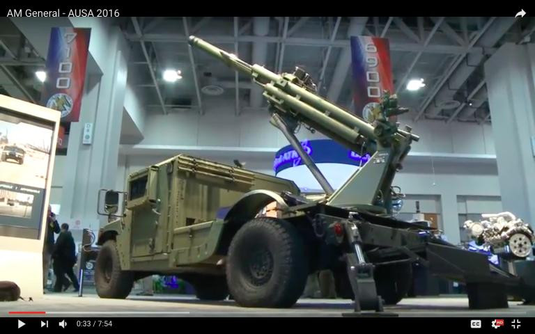 Một chiếc Humvee lắp lựu pháo 105 mm có độ giật thấp Một chiếc Humvee lắp lựu pháo 105 mm có độ giật thấp